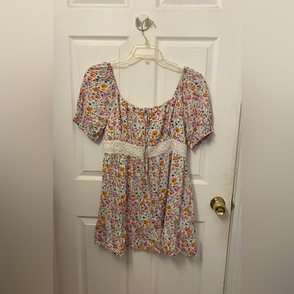 Pink orange flowered white peasant dress with lace waistline.